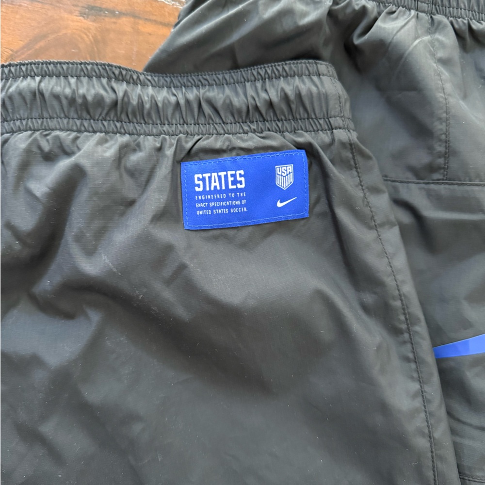 Nike Black Track Pants with Blue 'STATES' Patch